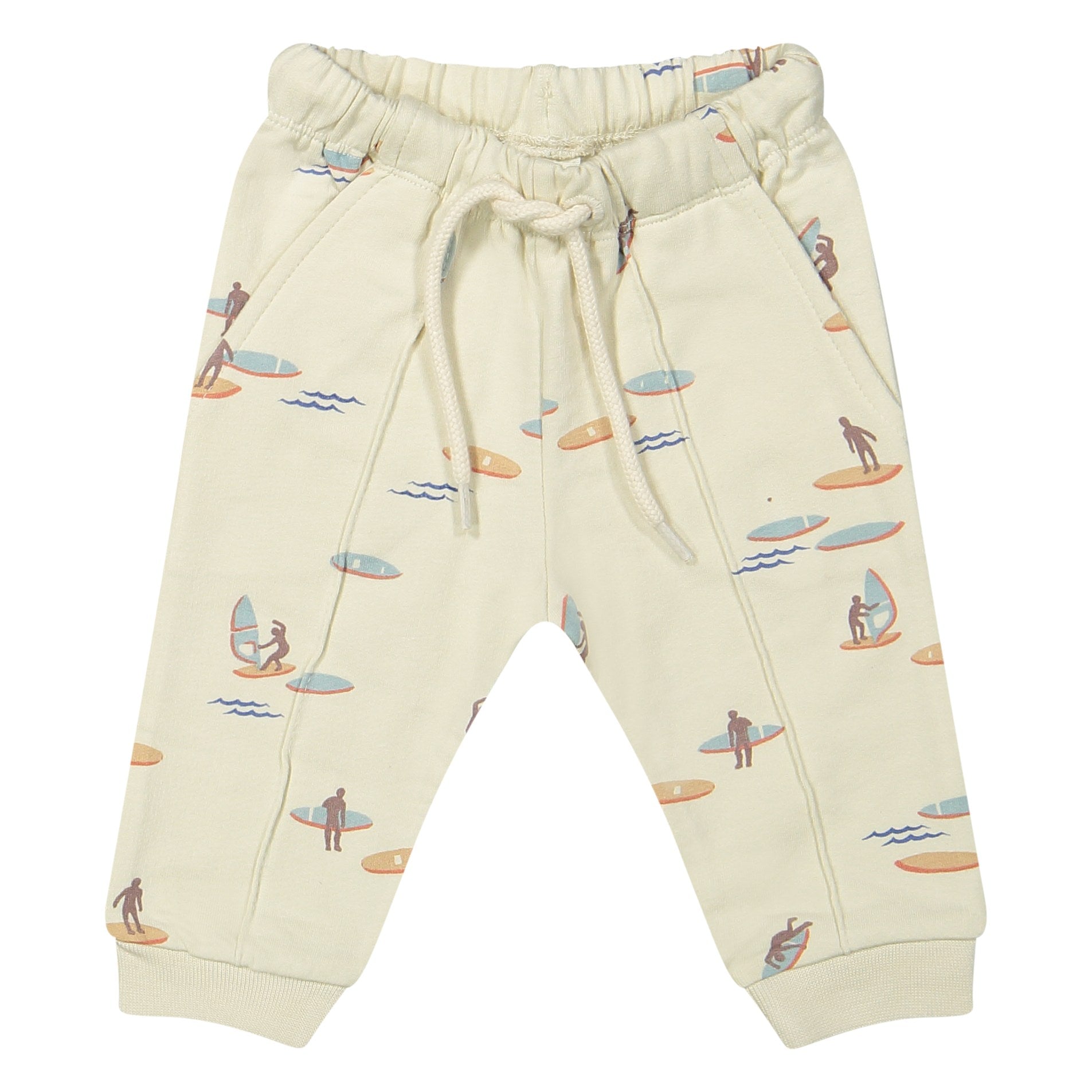 Riffle Amsterdam broek met surfer- en golfprint op natuurlijke achtergrond, flatlay vooraanzicht
