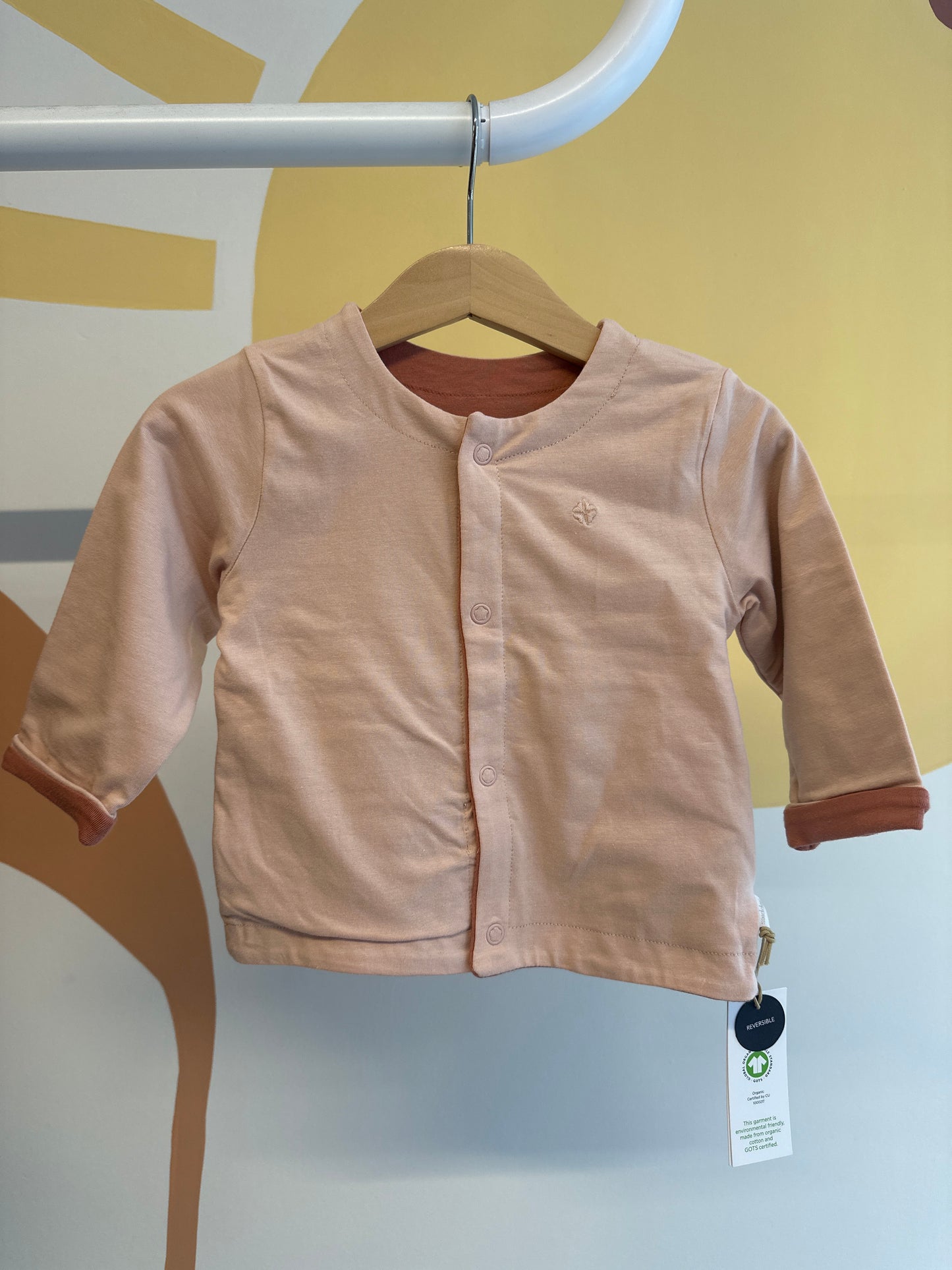 Vestje Noppies roze/koraal (twee kanten te dragen)