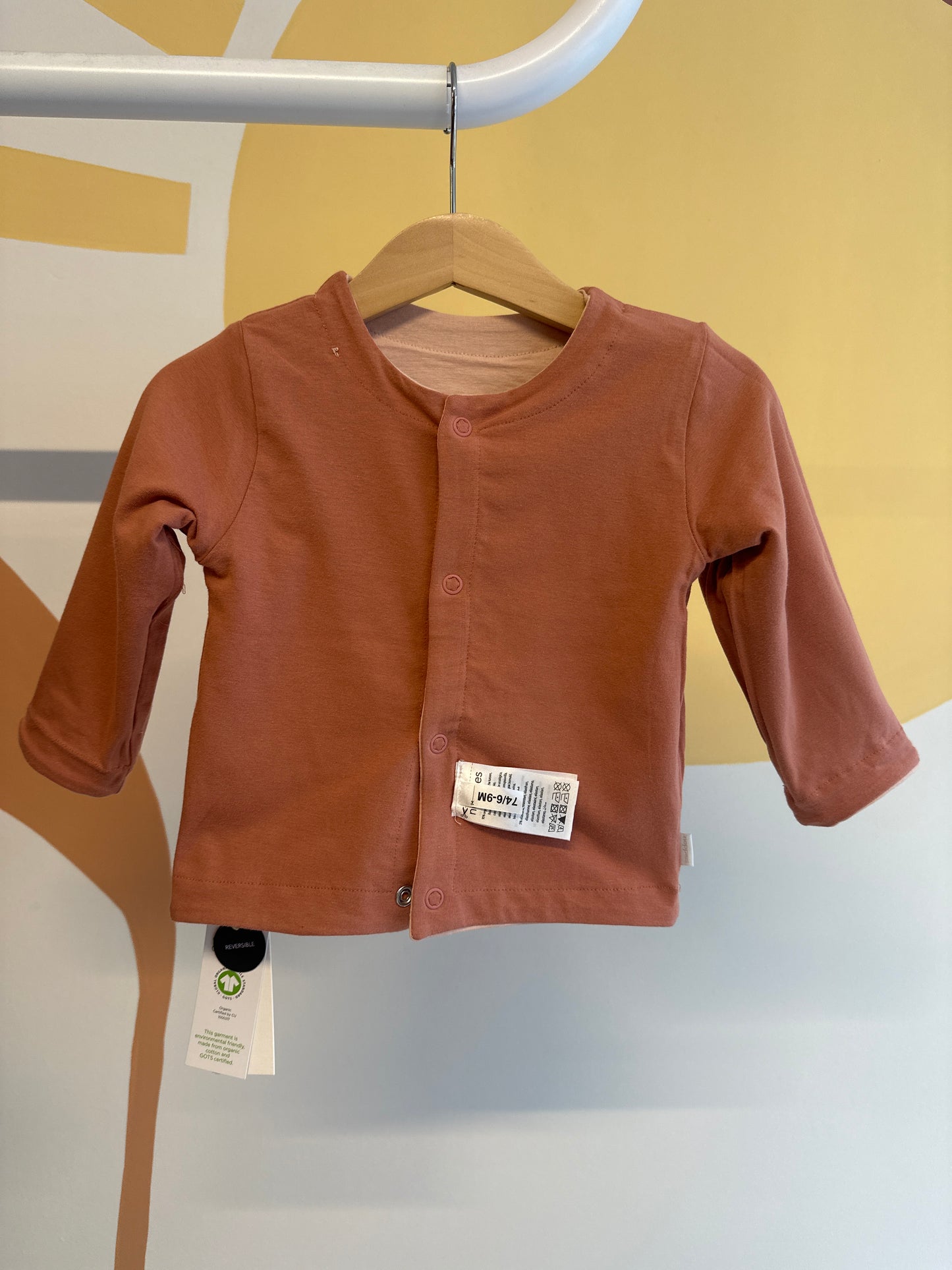 Vestje Noppies roze/koraal (twee kanten te dragen)