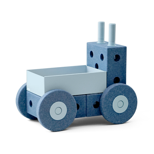 MODU 3-in-1 Baby Walker in Deep Blue met Sky Blue details, zijaanzicht met wielen en speelkubus.