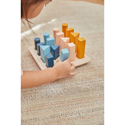 Houten geometrisch pegboard