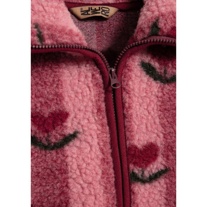 Alwero Belins Junior wollen vest in cherry met rits, close-up van ritssluiting en patroon detail