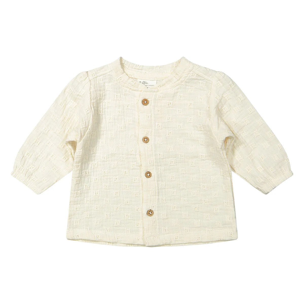 Riffle Amsterdam blouse met geborduurd patroon, frontal gelegd tegen witte achtergrond, houten knoopdetails zichtbaar
