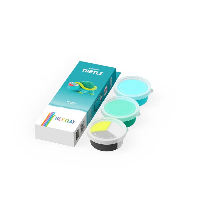 HEY CLAY boetseerklei set met schildpad: verpakking, kleurinstructies en drie potjes klei in turquoise, groen en geel