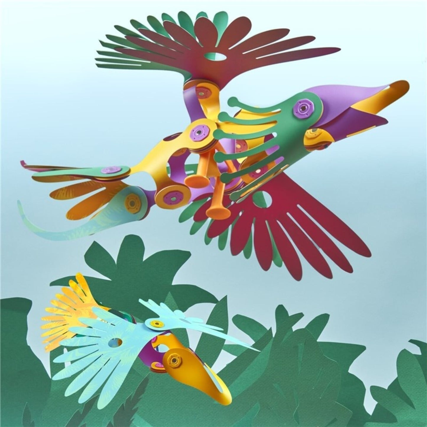 Clixo magnetisch bouwspeelgoed met twee tropische vogels in levendige kleuren tegen groene bladeren, één vogel in vlucht boven met rood-geel design, é