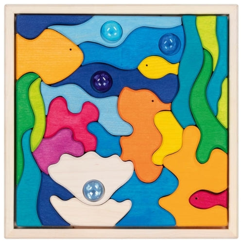 Landschap puzzel bouwblokken onder de zee