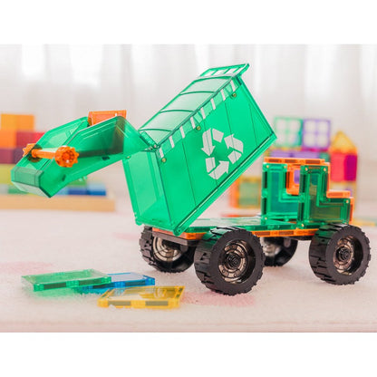 Learn & Grow magnetische afvaltruck met gekantelde laadkuip en losse tegels, schuin zijaanzicht