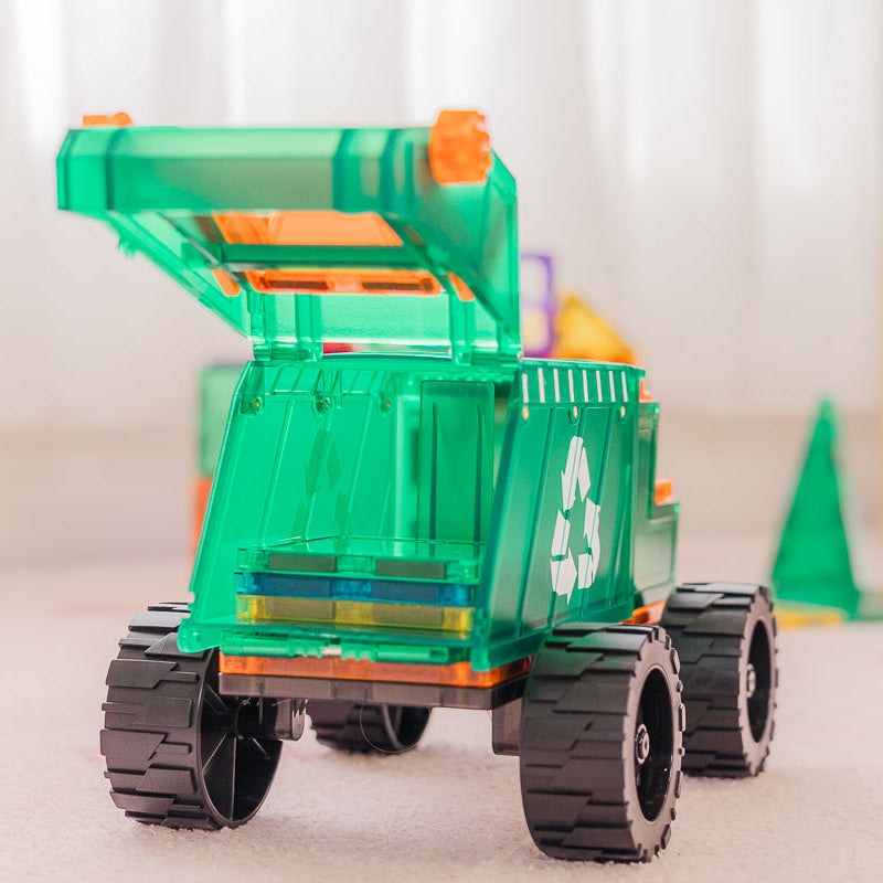 Learn & Grow magnetische afvaltruck met geopende laadklep en zwarte wielen, vooraanzicht op neutrale achtergrond