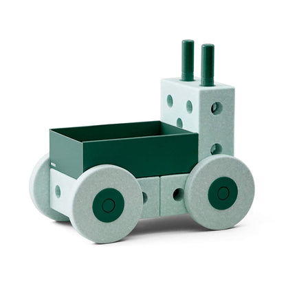 MODU 3-in-1 baby walker in ocean mint en forest green, zijkant aanzicht met wielen en duwstangen, speelgoed voor peuters
