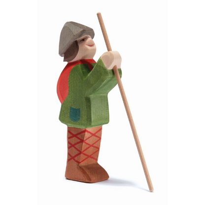 Herder staand met stok