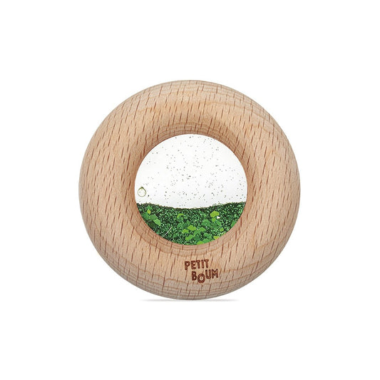Petit Boum sensorische donut groen met houten ring, vooraanzicht met zichtbare glitter beweging