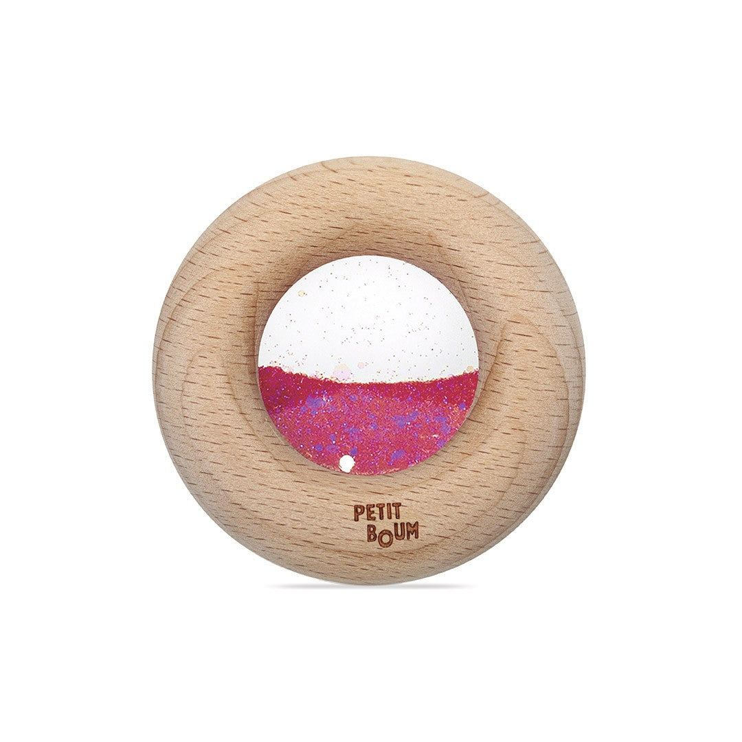Petit Boum sensorische donut roze met houten rand, vooraanzicht met zichtbare glitter en bewegende elementen