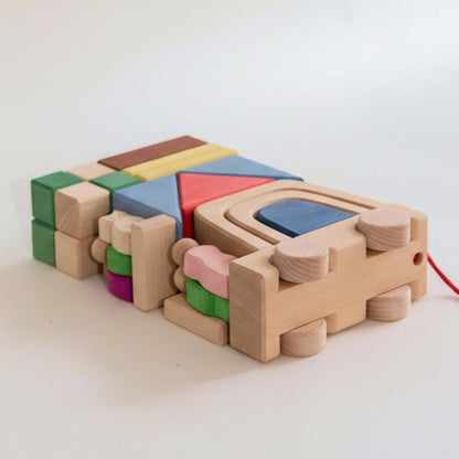 Avdar houten blokken trailer travel set met gekleurde onderdelen en wielen, bovenaanzicht detail